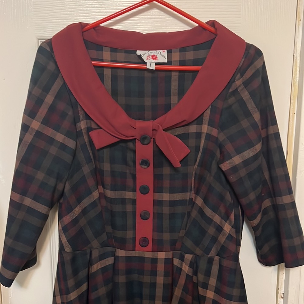 Miss Candyfloss Plaid Dress With 3/4 length sleeves and buttons down the front